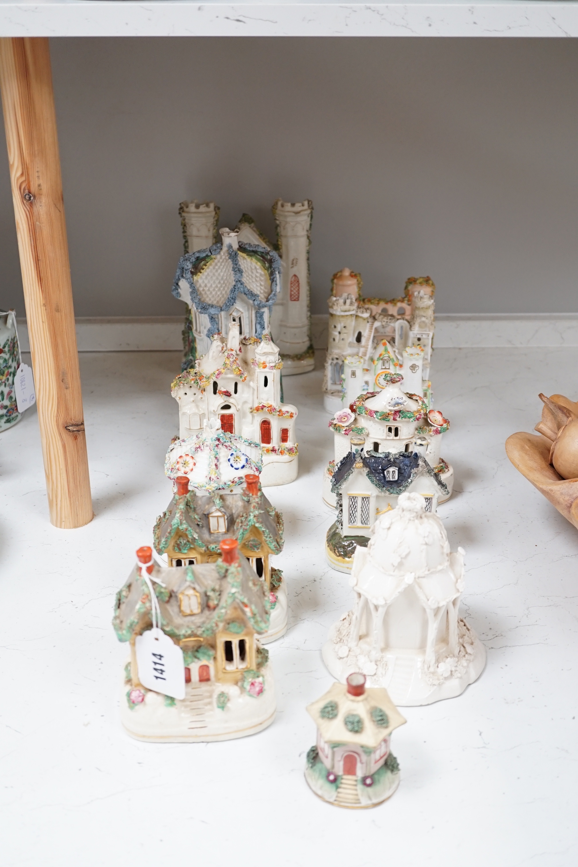 Thirteen Staffordshire 'cottage’ pastille burners or models